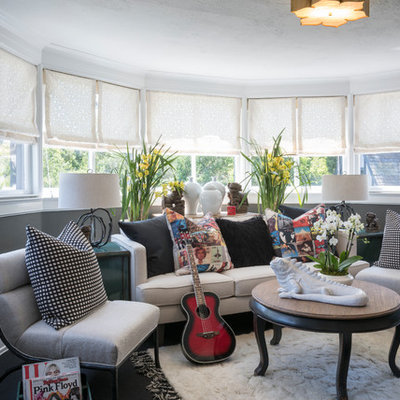 Inspiration for a transitional enclosed carpeted and black floor family room remodel in Los Angeles with a music area and gray walls