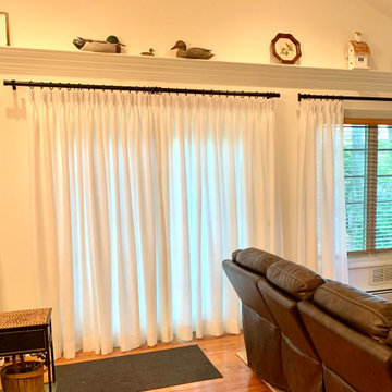 Pinch Pleat Linen Drapery Panels on a Rustic Bronze TRAX Rod in Family Room