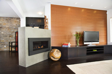 Family room - large contemporary open concept dark wood floor family room idea in Calgary with white walls and a ribbon fireplace