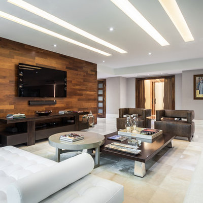 Inspiration for a large contemporary open concept linoleum floor family room remodel in Miami with no fireplace, a wall-mounted tv and white walls