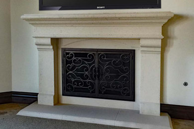 Large enclosed family room photo in San Diego with a wall-mounted tv