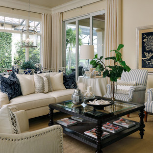 Example of a classic family room design in Miami with beige walls