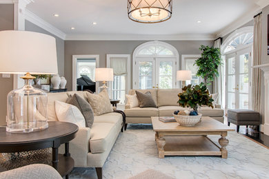 Example of a transitional family room design in Raleigh