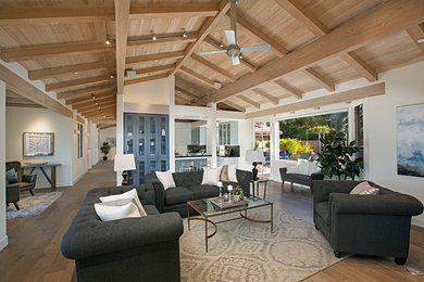 Example of a transitional family room design in San Diego