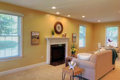 Example of a mid-sized eclectic open concept white floor family room design in Philadelphia with yellow walls, a standard fireplace and a wood fireplace surround