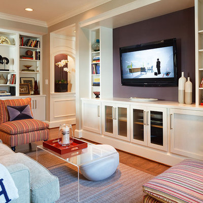 Inspiration for a contemporary medium tone wood floor family room remodel in DC Metro with purple walls and a media wall