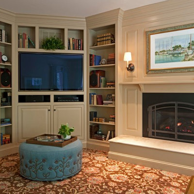 Mid-sized transitional enclosed carpeted and brown floor family room library photo in DC Metro with beige walls, a standard fireplace, a media wall and a metal fireplace