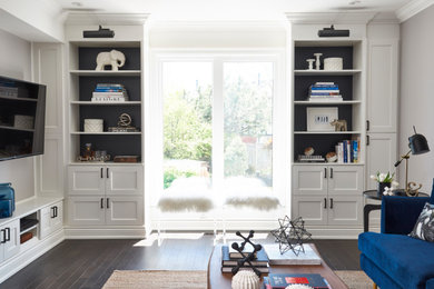 Example of a mid-sized trendy open concept dark wood floor and black floor family room design in Toronto with white walls, a two-sided fireplace, a stone fireplace and a wall-mounted tv