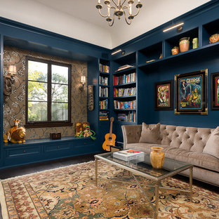 Family room library - mid-sized transitional enclosed dark wood floor and brown floor family room library idea in Los Angeles with blue walls