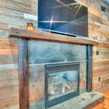 Rustic Fireplace with Barn Wood Mantel & Concrete Hearth