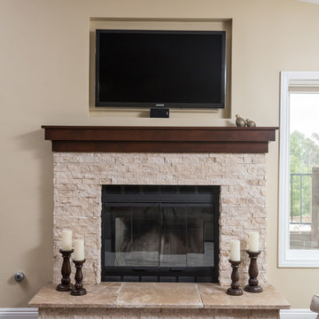 Fireplace Renovation with Dark Wood Mantle