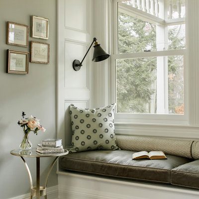Example of an ornate dark wood floor family room design in Boston with gray walls