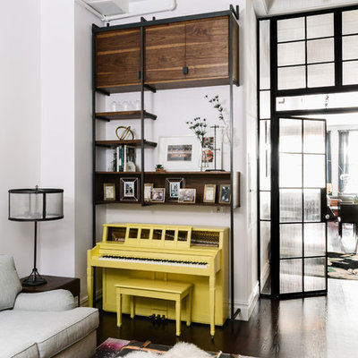 Family room - mid-sized contemporary enclosed dark wood floor family room idea in New York with a music area, white walls and no fireplace