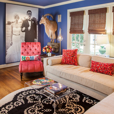 Family room - traditional family room idea in Houston with blue walls