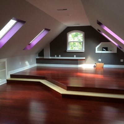 Inspiration for a craftsman loft-style dark wood floor family room remodel in Raleigh with multicolored walls