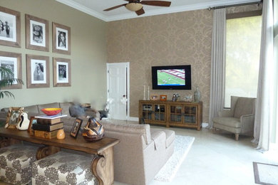 Large minimalist open concept travertine floor family room photo in Miami with brown walls and a wall-mounted tv