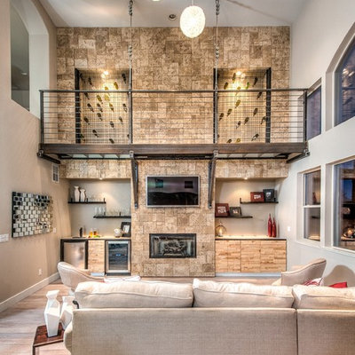 Trendy open concept medium tone wood floor family room photo in San Diego with beige walls, a wall-mounted tv and a ribbon fireplace
