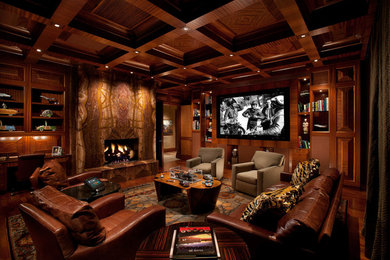 フェニックスにある広いトランジショナルスタイルのおしゃれなファミリールーム (茶色い壁、無垢フローリング、標準型暖炉、石材の暖炉まわり、壁掛け型テレビ、茶色い床) の写真