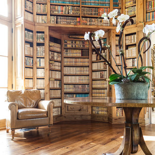 Inspiration for a mediterranean family room library remodel in Dallas