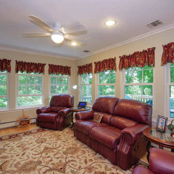 Sunroom-Like Family Room with New Windows - Renewal by Andersen