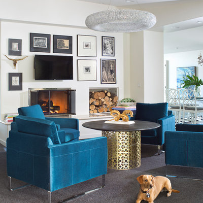 Inspiration for an eclectic open concept family room remodel in Denver with white walls, a standard fireplace and a wall-mounted tv