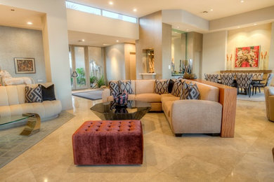 Example of a trendy marble floor, beige floor and wallpaper family room design in Other with beige walls