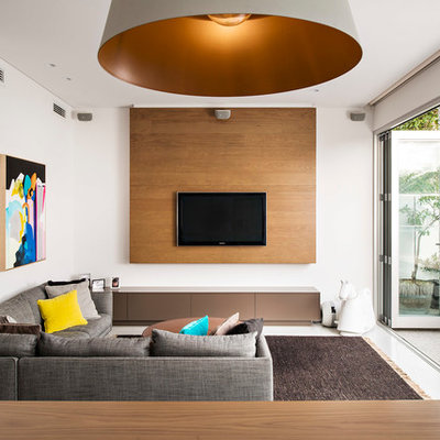 Example of a trendy open concept family room design in Perth with white walls, a wall-mounted tv and no fireplace