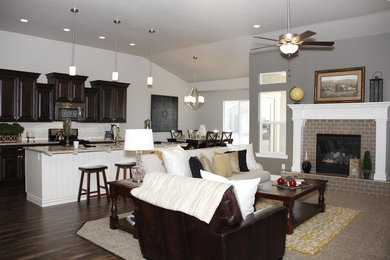 Example of a mid-sized classic open concept dark wood floor family room design in Salt Lake City with gray walls, a standard fireplace and a tile fireplace