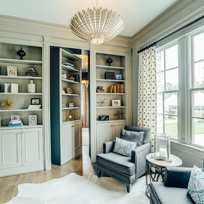 Inspiration for a timeless light wood floor family room library remodel in Richmond