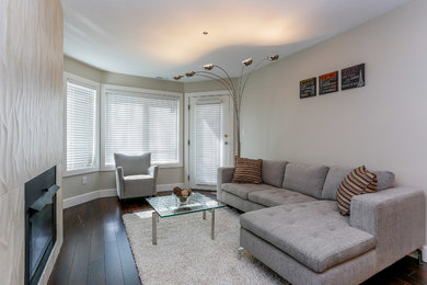 Example of a minimalist family room design in Vancouver