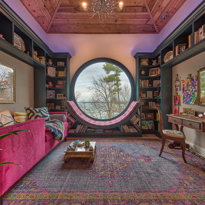 Example of a mid-sized eclectic blue floor family room library design in Other with beige walls
