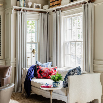 Inspiration for a timeless family room library remodel in Boston with beige walls