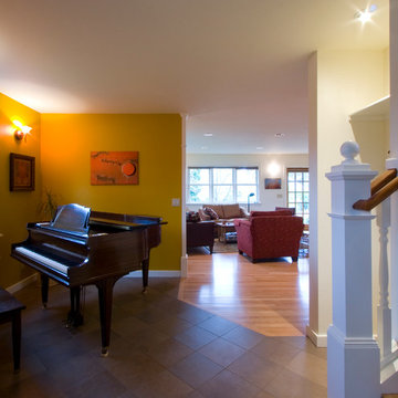 The piano and living room portion of a 2 story addition