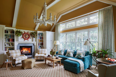 Example of a transitional enclosed carpeted, beige floor, exposed beam and wainscoting family room design in Chicago with yellow walls, a standard fireplace, a tile fireplace and a wall-mounted tv