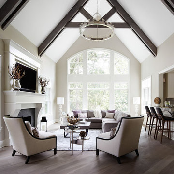 Transitional Cathedral Family Room with Wood Beams