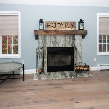 Transitional Fantasy Brown Quartzite Fireplace Surround with French Oak Flooring