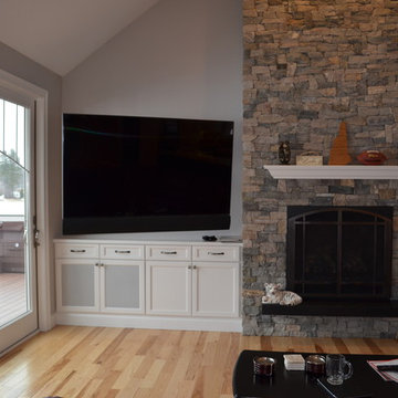 Transitional New Constrn. Family Room cabinets w/ stone fireplace surround