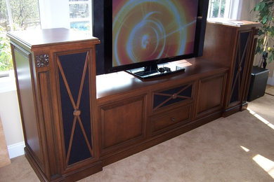 Example of a mid-sized classic open concept carpeted game room design in Philadelphia with beige walls and a tv stand