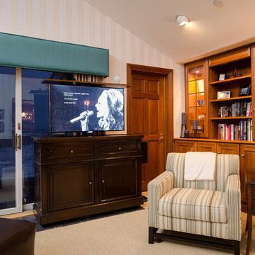 TV lift kit cabinet in family room is retractable by remote in San Francisco