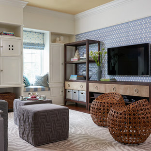 Family room - large transitional enclosed medium tone wood floor family room idea in New York with a wall-mounted tv and multicolored walls