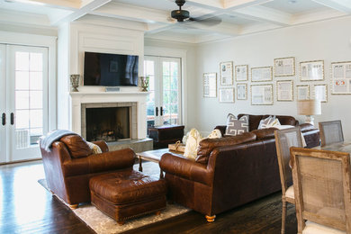 Inspiration for a timeless open concept dark wood floor family room remodel in Atlanta with a standard fireplace, a tile fireplace and a wall-mounted tv