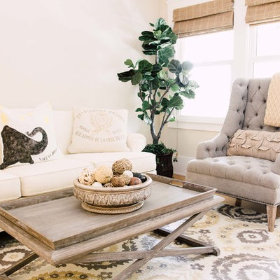 Family room - country light wood floor family room idea in Sacramento with beige walls