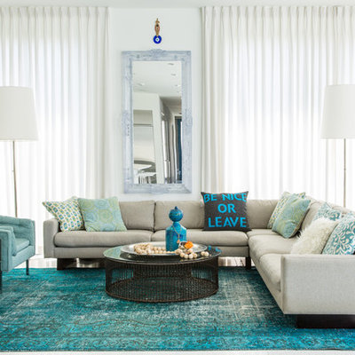 Family room - contemporary open concept family room idea in New Orleans with white walls