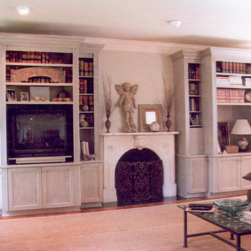 Various custom fireplace mantles, bookcases, and entertainment centers.