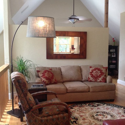 Family room - small craftsman loft-style light wood floor family room idea in Dallas with beige walls