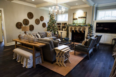 Family room - mid-sized rustic enclosed dark wood floor family room idea in Nashville with gray walls, a standard fireplace, a tile fireplace and a wall-mounted tv
