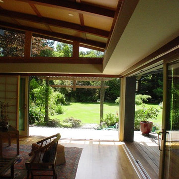 view of rear garden through Japanese arbor, from remodeled family