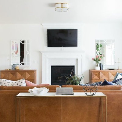 Example of a mid-sized transitional open concept medium tone wood floor family room design in Salt Lake City with white walls, a standard fireplace, a stone fireplace and a wall-mounted tv