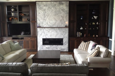 Example of a classic family room design in Toronto