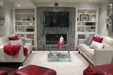 Example of a trendy enclosed medium tone wood floor family room design in Toronto with beige walls and a media wall